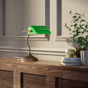 Art Deco desk lamp with green glass shade shell-shaped brass base with decorated design and sinuous stem by Ghidini 1849 - Finish: OAS Antique Brass