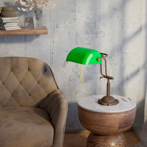 Banker's lamp with green glass shade double joint ornamental brass base with leaf motifs and pull chain by Ghidini 1849 - Finish: OAS Antique Brass