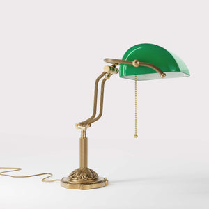 Banker's lamp with green glass shade double joint ornamental brass base with leaf motifs and pull chain by Ghidini 1849 - Finish: OBS Bronze Satin Brass
