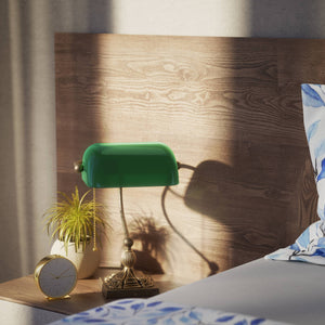 Banker’s lamp in brass with green glass shade, decorative base, and pull-chain switch. Elegant desk or decorative lighting by Ghidini 1849 - Finish: OAS Antique Brass