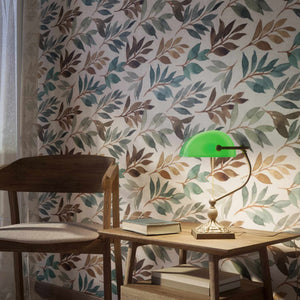 Banker’s lamp in brass with green glass shade, decorative base, and pull-chain switch. Elegant desk or decorative lighting by Ghidini 1849 - Finish: OAS Antique Brass