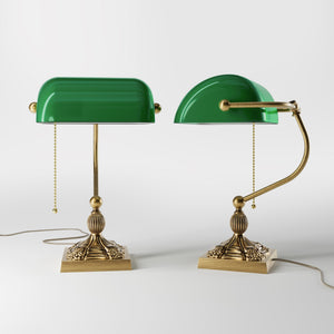 Banker’s lamp in brass with green glass shade, decorative base, and pull-chain switch. Elegant desk or decorative lighting by Ghidini 1849 - Finish: OBS Bronze Satin Brass