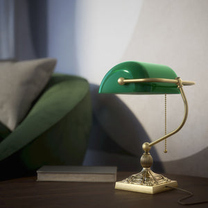 Banker’s lamp in brass with green glass shade, decorative base, and pull-chain switch. Elegant desk or decorative lighting by Ghidini 1849 - Finish: OBV Bronze Satin Light Brass