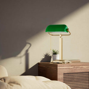 Executive library lamp with green glass shade and brass structure, decorative geometric base and golden pull chain by Ghidini 1849 - Finish: OBS Bronze Satin Brass