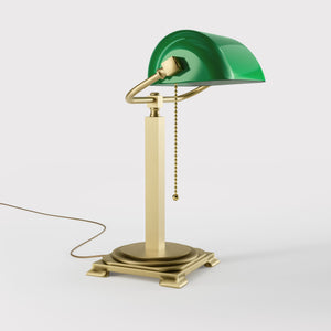 Executive library lamp with green glass shade and brass structure, decorative geometric base and golden pull chain by Ghidini 1849 - Finish: OBV Bronze Satin Light Brass