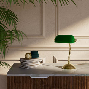 Mini banker's lamp with green glass shade and curved stem, domed brass base, compact design by Ghidini 1849 - Finish: OLV Polished Brass