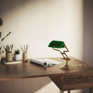 Small banker's lamp with green shade, adjustable brass arm and turned stepped base by Ghidini 1849 - Finish: OBS Bronze Satin Brass