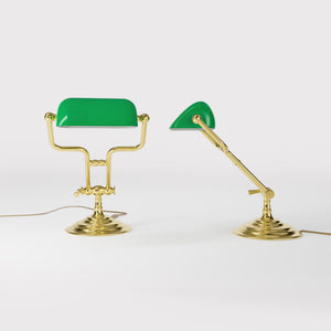 Small banker's lamp with green shade, adjustable brass arm and turned stepped base by Ghidini 1849 - Finish: OLV Polished Brass