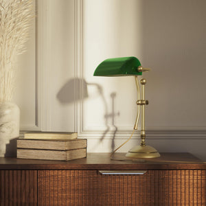 Compact banker's desk lamp with green shade, height-adjustable arm and brass structure by Ghidini 1849 | Finish: OBV Bronze Satin Light Brass
