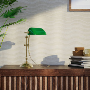 Compact banker's desk lamp with green shade, height-adjustable arm and brass structure by Ghidini 1849 | Finish: OLV Polished Brass
