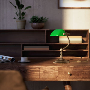 Small banker's desk lamp with green glass shade and brass structure for compact spaces by Ghidini 1849 - Finish: OAS Antique Brass