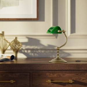 Small banker's desk lamp with green glass shade and brass structure for compact spaces by Ghidini 1849 - Finish: OBV Bronze Satin Light Brass