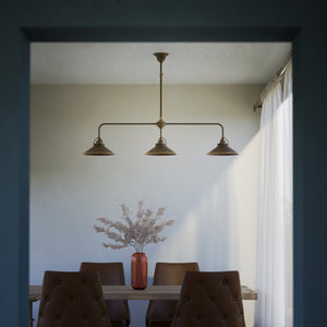 Brass chandelier with three conical shades, adjustable height, classic and versatile design by Ghidini 1849 - Finish: OAS Antique Brass