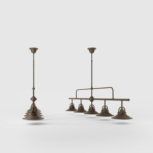 Industrial linear brass pendant with five symmetrical conical shades for dramatic lighting effect by Ghidini 1849 - Finish: OAS Antique Brass