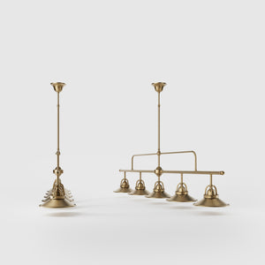 Industrial linear brass pendant with five symmetrical conical shades for dramatic lighting effect by Ghidini 1849 - Finish: OBS Bronze Satin Brass