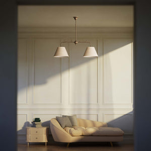 Brass balance pendant lamp with two linen-effect fabric shades and decorative scrolls bistro style Made in Italy by Ghidini 1849 - Finish: OAS Antique Brass