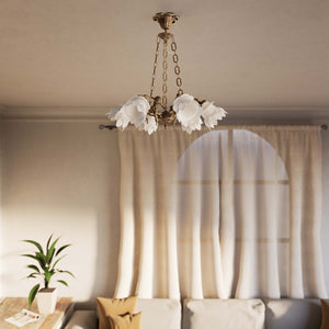 Art Nouveau chandelier with six brass putti and rose-shaped frosted glass shades, decorated chains and floral rosette by Ghidini 1849 - Finish: OAS Antique Brass