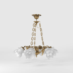 Art Nouveau chandelier with six brass putti and rose-shaped frosted glass shades, decorated chains and floral rosette by Ghidini 1849 - Finish: OBS Bronze Satin Brass