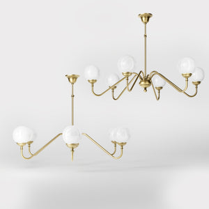 Art Deco chandelier with six glossy white glass spheres and brass structure, elegant Italian design for interior lighting - Finish: OBV Bronze Satin Light Brass