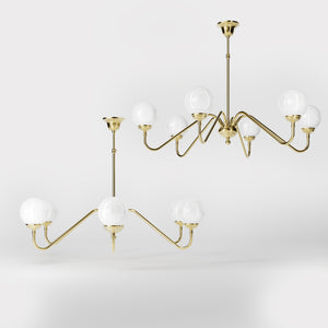 Art Deco chandelier with six glossy white glass spheres and brass structure, elegant Italian design for interior lighting - Finish: OLV Polished Brass
