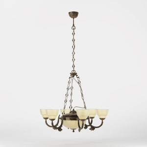Neoclassical brass chandelier with six decorated arms, central bowl and ornamental chains, diamond-patterned frosted glass diffusers by Ghidini 1849 - Finish: OAS Antique Brass