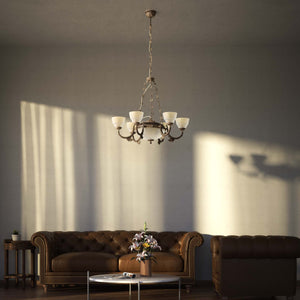 Neoclassical brass chandelier with six decorated arms, central bowl and ornamental chains, diamond-patterned frosted glass diffusers by Ghidini 1849 - Finish: OAS Antique Brass