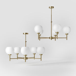 Brass chandelier with five opal glass spheres, modern and elegant design, perfect for stylish and contemporary interiors by Ghidini 1849 - Finish: OBV Bronze Satin Light Brass