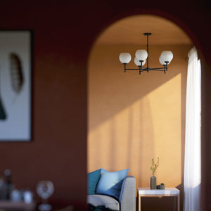 Brass chandelier with five opal glass spheres, modern and elegant design, perfect for stylish and contemporary interiors by Ghidini 1849 - Finish: ONO Matt Black