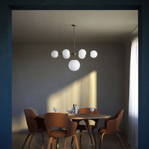 Brass chandelier with white opal glass spheres, ideal for decorative lighting by Ghidini 1849 - Finish: OBM Bronze Satin Matt Brass