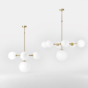 Brass chandelier with white opal glass spheres, ideal for decorative lighting by Ghidini 1849 - Finish: OBV Bronze Satin Light Brass