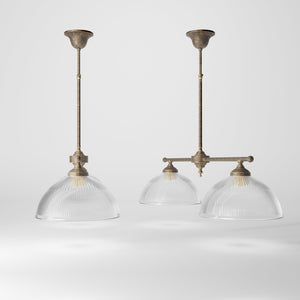 Billiard chandelier in brass with two ribbed glass shades, ideal for dining tables and billiard rooms by Ghidini 1849 - Finish: OAS Antique Brass