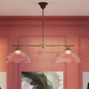 Billiard chandelier in brass with two ribbed glass shades, ideal for dining tables and billiard rooms by Ghidini 1849 - Finish: OAS Antique Brass