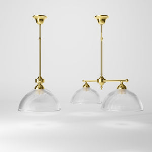 Billiard chandelier in brass with two ribbed glass shades, ideal for dining tables and billiard rooms by Ghidini 1849 - Finish: OLV Polished Brass