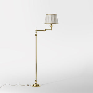 Classic brass floor lamp with adjustable arm, ivory fabric shade, elegant design, and versatile functionality for interiors by Ghidini 1849 - Finish: OLV Polished Brass