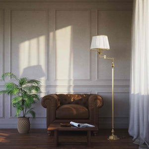 Classic brass floor lamp with adjustable arm, ivory fabric shade, elegant design, and versatile functionality for interiors by Ghidini 1849 - Finish: OLV Polished Brass