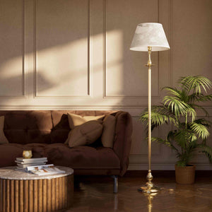 Classic brass floor lamp with decorated white fabric shade fluted stem ornamental base floral details traditional style - Finish: OLV Polished Brass