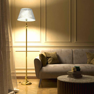 Classic brass floor lamp with decorated white fabric shade fluted stem ornamental base floral details traditional style - Finish: OLV Polished Brass