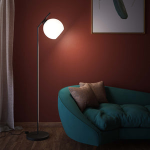 Brass floor lamp with opal glass sphere, modern and elegant design, perfect for stylish and contemporary interiors by Ghidini 1849 - Finish: ONO Matt Black