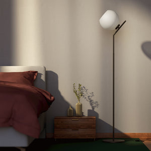 Brass floor lamp with opal glass sphere, tilted design, perfect for contemporary and refined interiors by Ghidini 1849 - Finish: ONO Matt Black