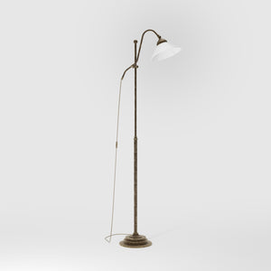 Adjustable brass floor lamp with white glass shade, swivel arm and height adjustment system for customized lighting solutions by Ghidini 1849 - Finish: OAS Antique Brass