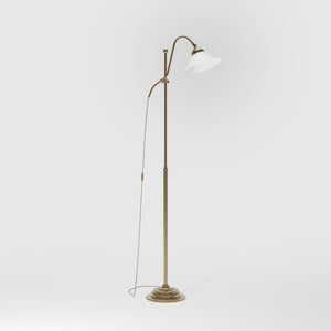 Adjustable brass floor lamp with white glass shade, swivel arm and height adjustment system for customized lighting solutions by Ghidini 1849 - Finish: OBS Bronze Satin Brass