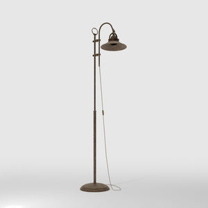 Industrial brass floor lamp with adjustable arm and swivel conical shade for targeted lighting by Ghidini 1849 - Finish: OAS Antique Brass