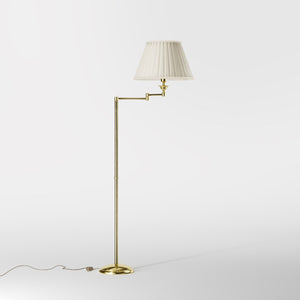 Brass floor lamp with ivory fabric shade and adjustable arm, ideal for elegant interiors by Ghidini 1849 - Finish: OLV Polished Brass