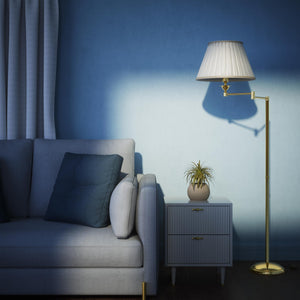 Brass floor lamp with ivory fabric shade and adjustable arm, ideal for elegant interiors by Ghidini 1849 - Finish: OLV Polished Brass