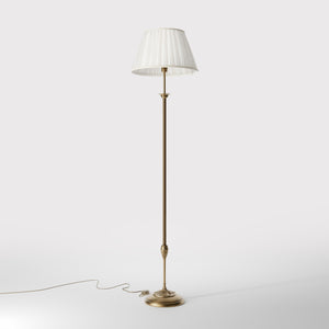 Classic floor lamp Simona collection with decorated brass stem and large pleated ivory white fabric lampshade on ornamental base by Ghidini 1849 - Finish: OBS Bronze Satin Brass