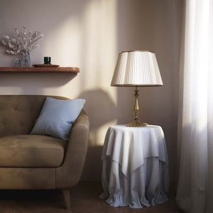 Classic brass table lamp with ivory pleated shade, shaped base and elegant decorations, Petalo collection Made in Italy by Ghidini 1849 - Finish: OBS Bronze Satin Brass