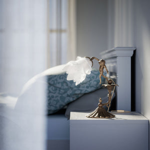 Art Nouveau table lamp with dancing brass putto, petal-shaped frosted glass shade, fan-decorated base by Ghidini 1849 - Finish: OAS Antique Brass