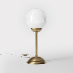 Art Deco table lamp with high stem circular base and glossy white glass globe classic Italian design - Finish: OBS Bronze Satin Brass