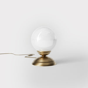 1930s style table lamp with glossy white glass globe and domed brass base Italian retro design - Finish: OBS Bronze Satin Brass