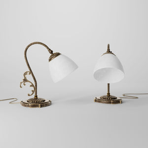 Art Nouveau brass table lamp with a spotted white glass shade and adjustable joint, ideal for elegant spaces by Ghidini 1849 - Finish: OAS Antique Brass
